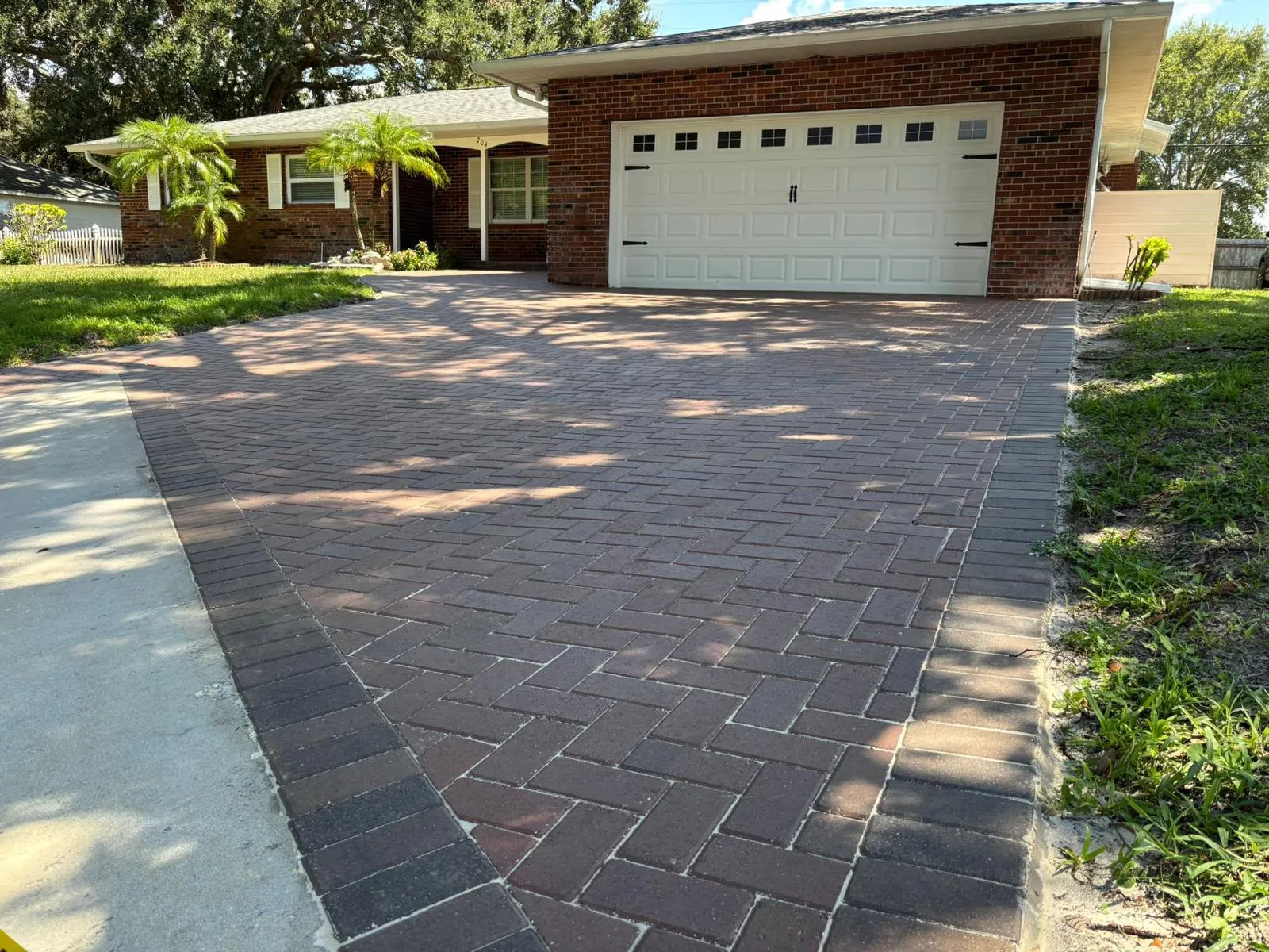 Brick paver driveway installed by Corestone Outdoor Living