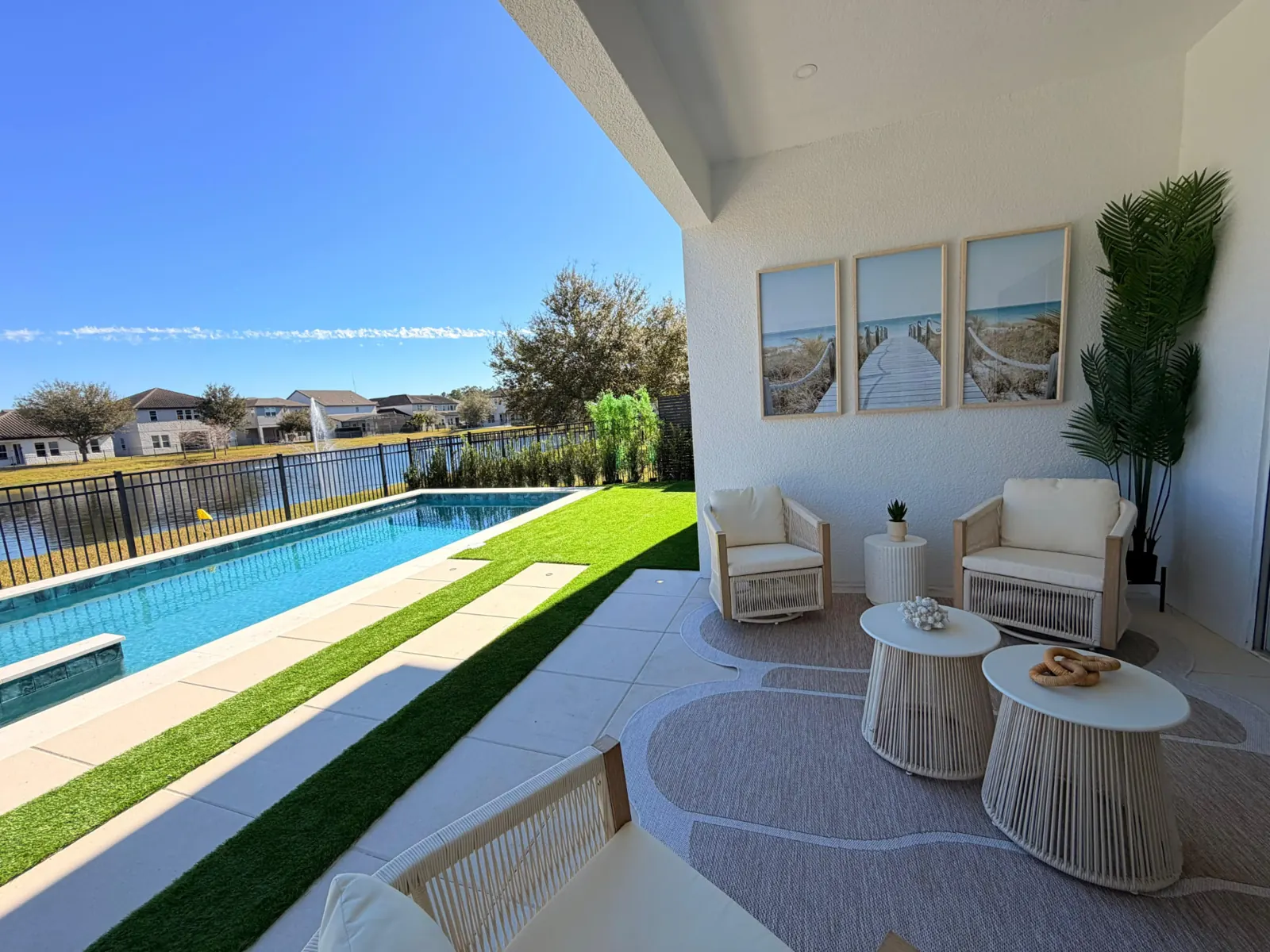 Covered patio and screened pool area built by Corestone