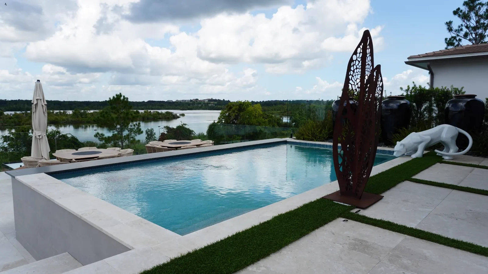 Lakefront Infinity Pool & Sculpture