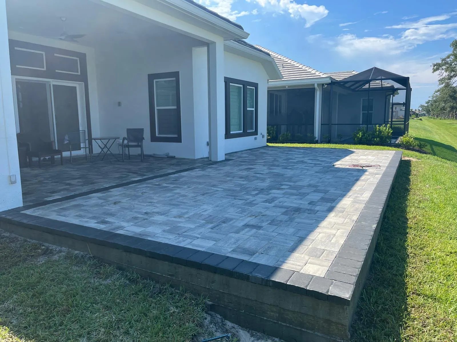 Charcoal-Bordered Paver Patio